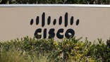 Cisco Systems Inc posted an increase in quarterly revenue that was slightly ahead of Wall Street expectations, suggesting that the network equipment maker may be seeing signs of improvement in technology spending.