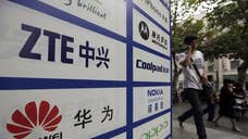 Europe's top trade official for the first time late on Friday officially cited Chinese mobile telecommunications equipment makers Huawei and ZTE Corp for violating anti-dumping and anti-subsidy guidelines.
