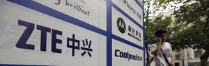 Europe's top trade official for the first time late on Friday officially cited Chinese mobile telecommunications equipment makers Huawei and ZTE Corp for violating anti-dumping and anti-subsidy guidelines.