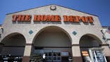 A nascent recovery in the housing market helped Home Depot Inc  report higher quarterly sales and earnings on Tuesday, prompting the world's largest home improvement chain to boost its sales outlook for the year.
