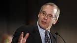 Two senior Federal Reserve officials on Tuesday played down chances that the U.S. central bank would signal a readiness to taper bond buying at its meeting next month, dampening speculation the Fed might soon dial back its ultra-easy policy.