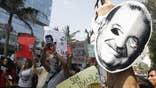 A U.S. cellphone company owned by Carlos Slim has asked Californian authorities to investigate the funding behind protests against the Mexican tycoon by lobby group Two Countries, One Voice.