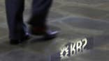 State-backed British lenders Lloyds Banking Group  and Royal Bank of Scotland  have agreed plans to shore up their capital with the financial regulator, removing a barrier to the government offloading its shares.