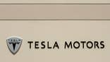 Electric carmaker Tesla Motors Inc  on Wednesday paid off its U.S. Department of Energy loan nine years earlier than required, using money raised last week in a stock and debt offering.