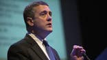 A top U.S. central bank official sought to reassure financial markets that the Federal Reserve was not in a hurry to start winding down its economic stimulus as investors worried about comments by its chairman Ben Bernanke.