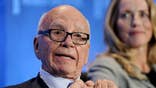 News Corp said on Friday it will write down the value of its Australian and U.S. publishing assets by up to $.