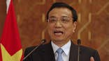 Chinese Premier Li Keqiang criticized the European Union over its plans to investigate alleged anti-competitive behavior by Chinese mobile telecom equipment makers and to impose punitive import duties on solar panels from China, state media reported.