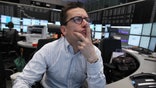 European shares wavered near five-year highs on Monday as traders remained bullish on the state of the world economy.