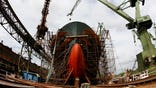 Output in factories across the eurozone shrunk faster in April than the month before, while the Chinese manufacturing sector contracted at a slower pace last month, data released on Wednesday showed.