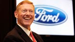 Moody’s Investors Service raised Ford's credit rating to “investment grade” and returned its coveted Blue Oval trademark.