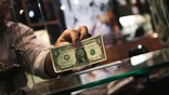 Even after the financial crisis and amid debt worries, the U.S. dollar's status as the world's go-to currency doesn't appear to be in serious jeopardy.