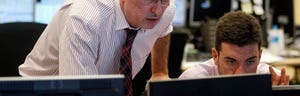 Asian markets buckled badly on Thursday after the Federal Reserve heralded an eventual end to free money and China turned the screw on credit even as factory activity in the world's second largest economy hit a nine-month low.