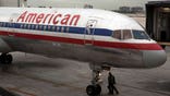American Airlines’ bankrupt parent AMR will cut more than $ billion in annual costs, with more than half coming from at least , job cuts.