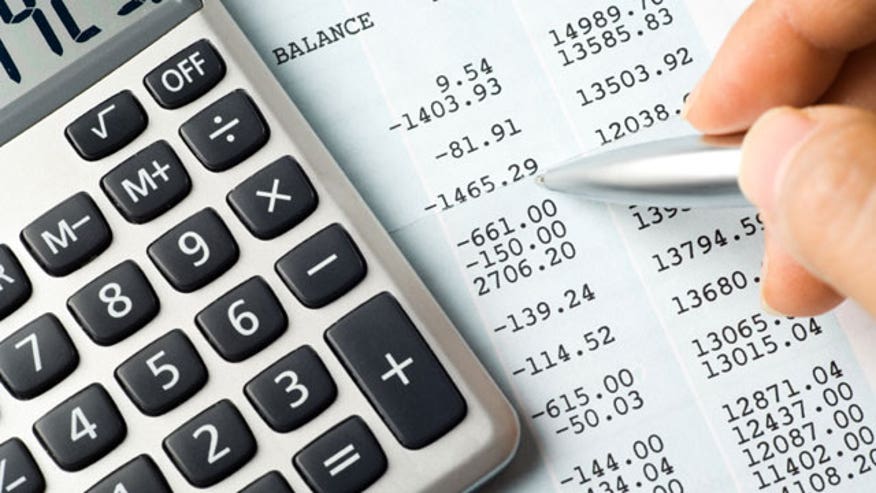 Calculator Lying on a Balance Sheet