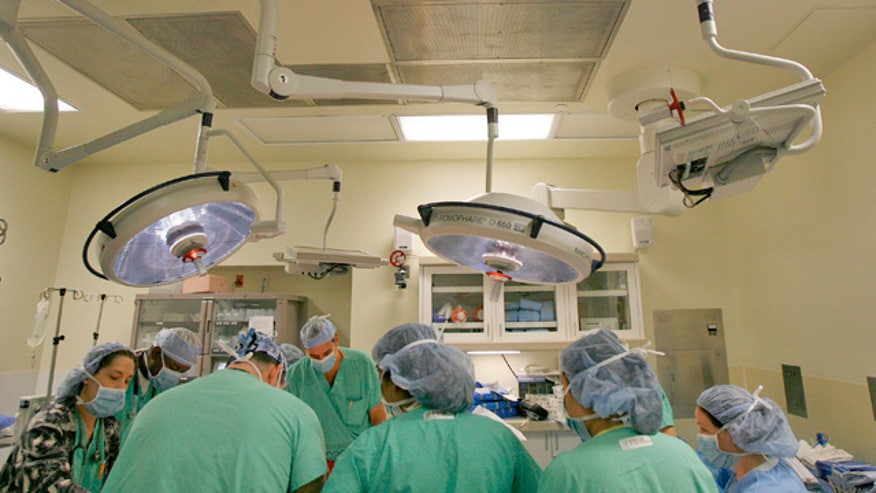 Surgeons in Operation Room