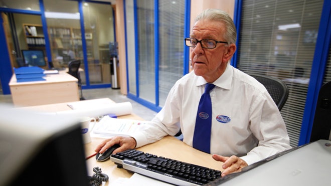 Elderly Man Working on Computer