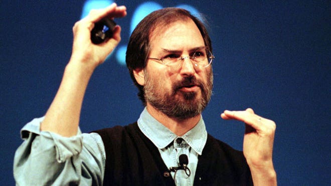 Steve Jobs talks during a presentation, 1997, Reuters