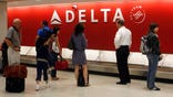 Delta Air Lines posted an operating loss in the first quarter but said it expects to make a profit next quarter despite higher fuel costs.