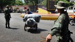 In just 12 hours, more than 35K Venezuelans cross Colombian border to buy food, medicine