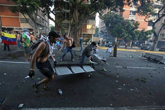 http://a57.foxnews.com/global.fncstatic.com/static/managed/img/fn-latino/news/660/438/Venezuela%20Protests%202.jpg?ve=1&tl=1