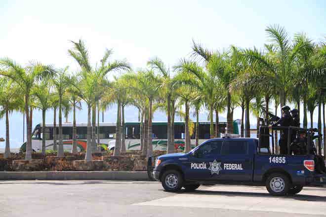 http://a57.foxnews.com/global.fncstatic.com/static/managed/img/fn-latino/news/660/440/7%20federal%20police.jpg?ve=1