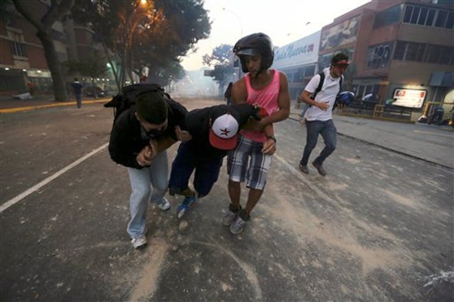 http://a57.foxnews.com/global.fncstatic.com/static/managed/img/fn-latino/news/660/440/Venezuela%20Protests%205.jpg?ve=1&tl=1