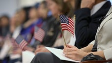 A federal judge presiding over a citizenship ceremony told attendants that if they don't like Trump as president, they should go to another country.