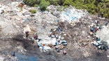 Drug gangs control illegal dumps near Rio's Olympic sites, complicating clean-up efforts