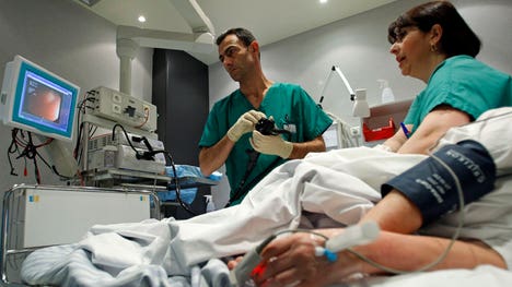 A colonoscopy or similar test could one day diagnose Parkinson's disease years before symptoms occur. That's because signs of Parkinson's that appear in the brain also show up in the colon, a new study says