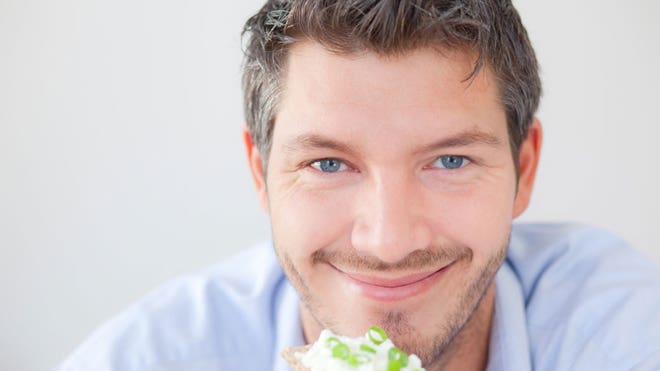 Man Eating Cherries