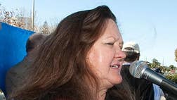 >Australia's richest person Gina Rinehart on Tuesday said she plans to relinquish control of a multi-billion dollar family trust, ending a long-running and bitter feud with two of her children.