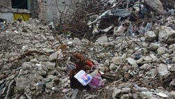 A Bangladeshi garment worker who spent  days in a coma after being badly injured in one of the world's worst industrial disasters has died, officials said on Monday.