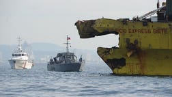 Philippine authorities Friday began a formal inquiry into a collision between a ferry and a cargo ship which killed at least  people and left  missing, as they considered calling off the search for survivors.