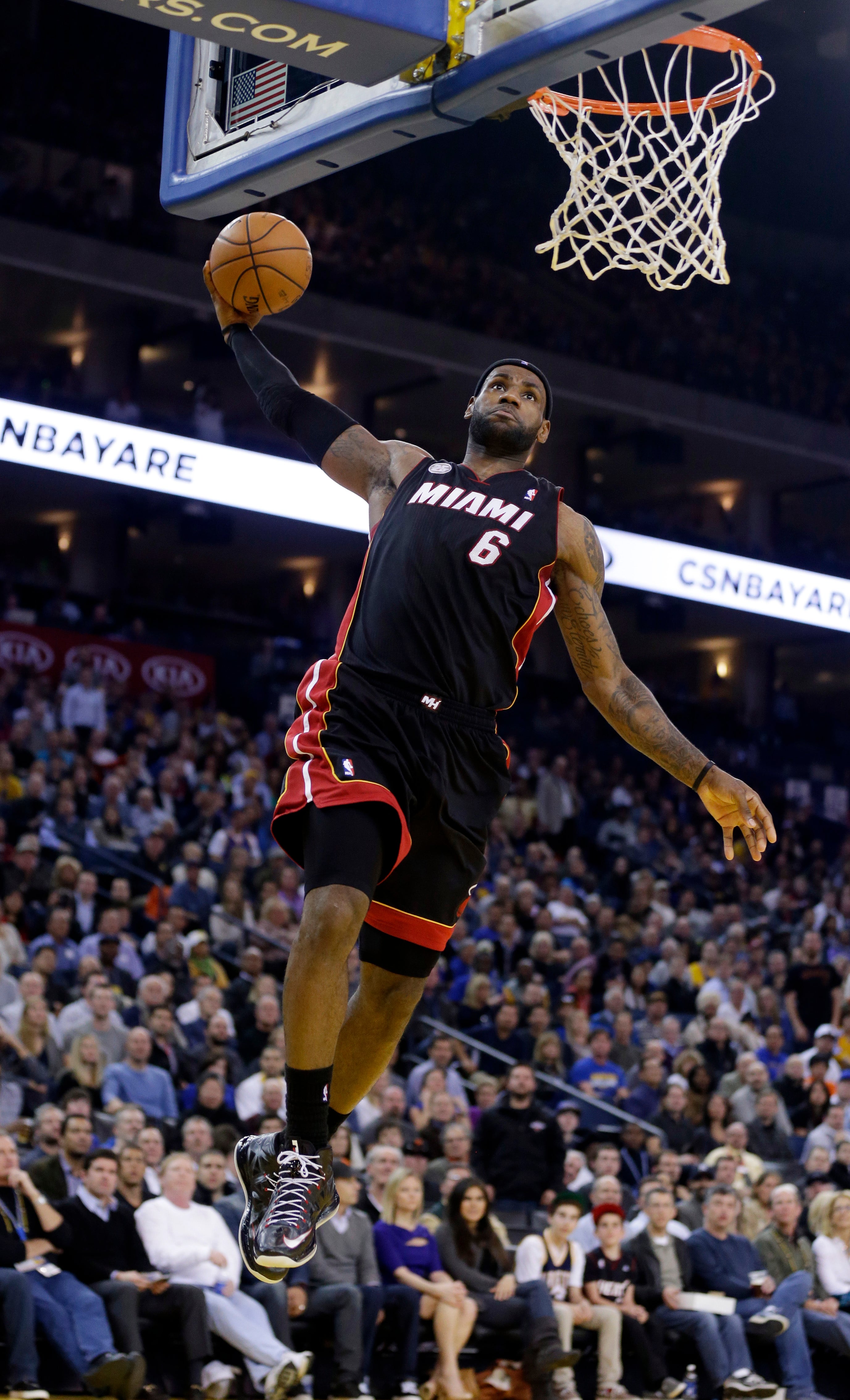 LeBron James eclipses 20,000 points, 5,000 assists as Heat ...