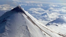 A remote Alaska volcano continues to erupt, spewing lava and ash clouds.