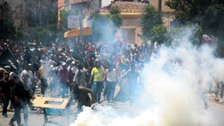  Around , police officers and soldiers blocked an annual conference Sunday at Tunisia's main religious center by a radical Islamist movement that has been implicated in attacks across the country, prompting clashes with angry youths that resulted in one death.
