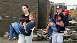 The state medical examiner's office has revised the death toll from a tornado in an Oklahoma City suburb to  people, including seven children.              