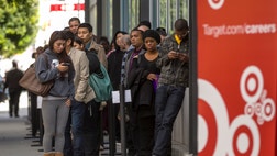  Target Corp. reported a  percent drop in first-quarter profit as cool temperatures and financial pressures limited customers' appetite for spending.