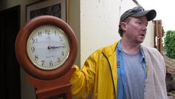 Dan Garland could feel the latch on the shelter door begin to turn in his hand.