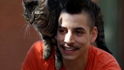  For bicyclist Rudi Saldia, you could say a cat is his co-pilot.
