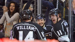  Jonathan Quick made  saves in his seventh career playoff shutout, and the Los Angeles Kings moved to the brink of their second straight trip to the Western Conference finals with a - victory over the San Jose Sharks in Game  on Thursday night.