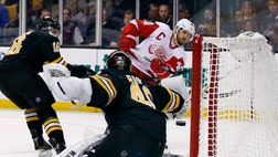  Stephen Weiss and Daniel Cleary scored second-period goals, reserve goaltender Jonas Gustavsson made  saves in his first action of the season and the Detroit Red Wings edged the Boston Bruins - Monday.