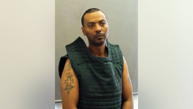  Police in northern Virginia have locked down a hospital and closed area roads while they search for a prisoner they say is armed and dangerous after he escaped custody.