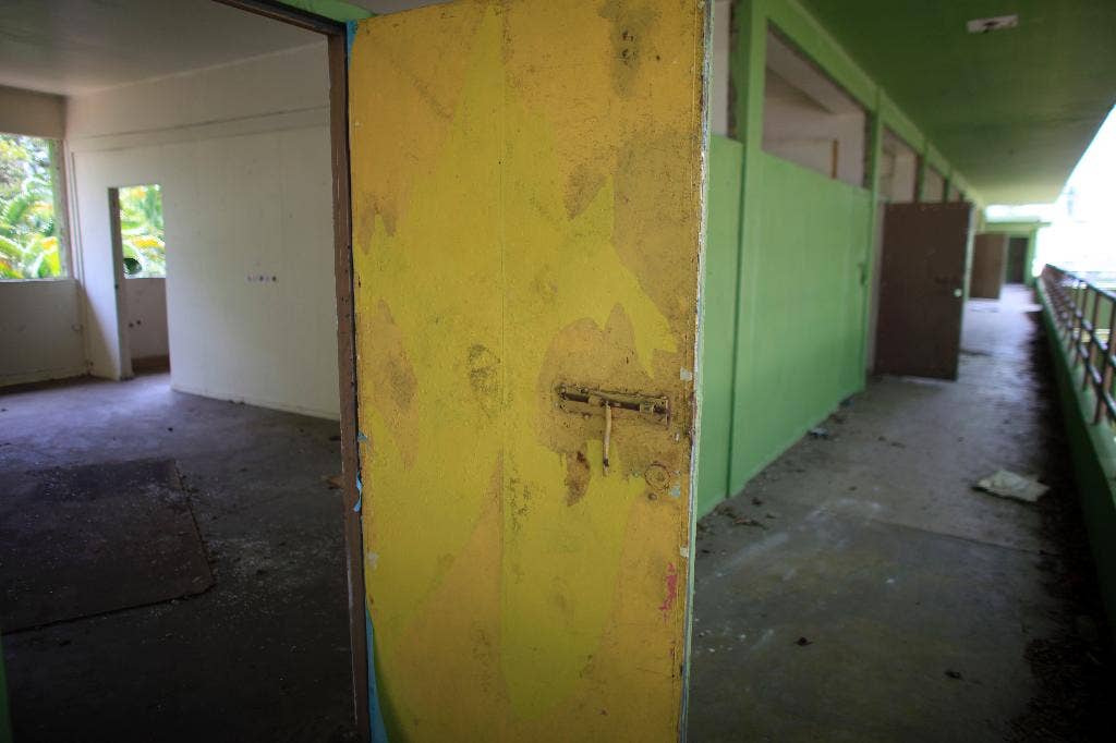 Officials: Puerto Rico governor seeks to close schools, agencies to balance budget