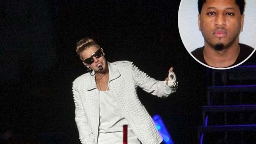 justin-biebers-bodyguard-arrested-600x450