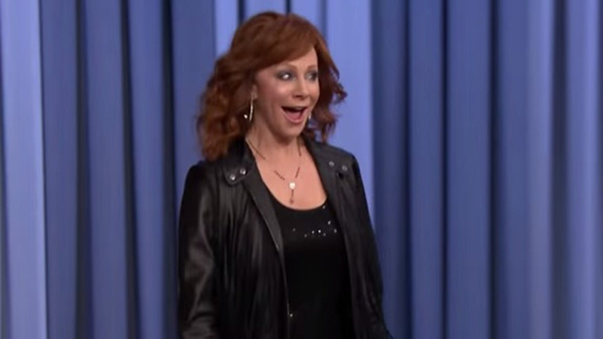 Reba all smiles post-split