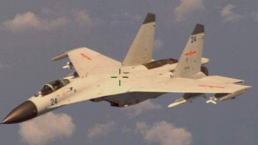 Chinese Fighter Jet Buzzes US Submarine Hunter54535