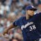 Brewers' Peralta shuts down Giants in return from DL