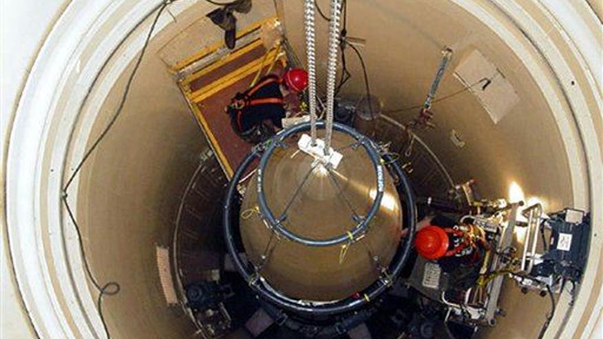 US keeping nuclear warheads in case of ��� killer asteroids