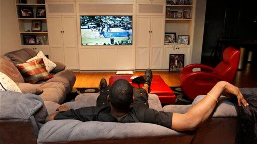Winding down after work with TV, video games can make you feel like a loser: study
